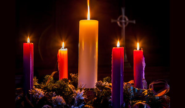 advent wreath with lit candles